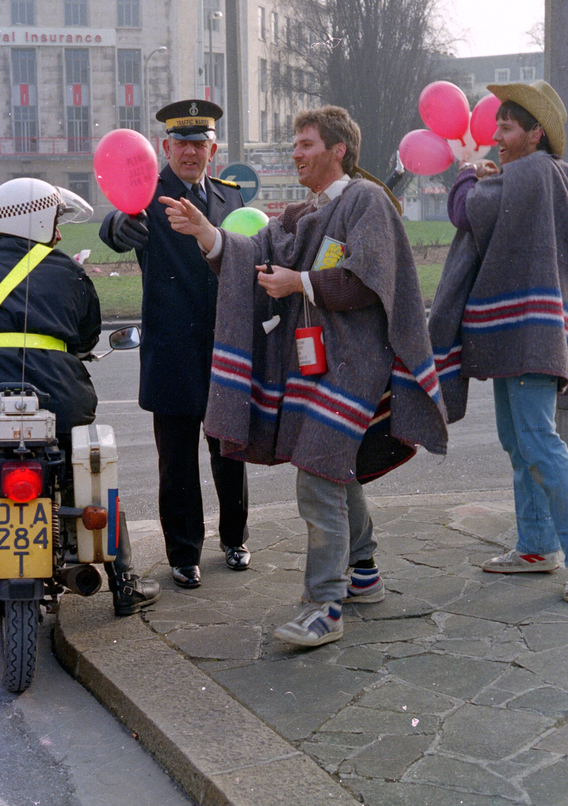 A traffic warden gets involved in St. Andrew's Cross from Uni: PPSU "Jazz" RAG Street Parade, Plymouth, Devon - 17th February 1986