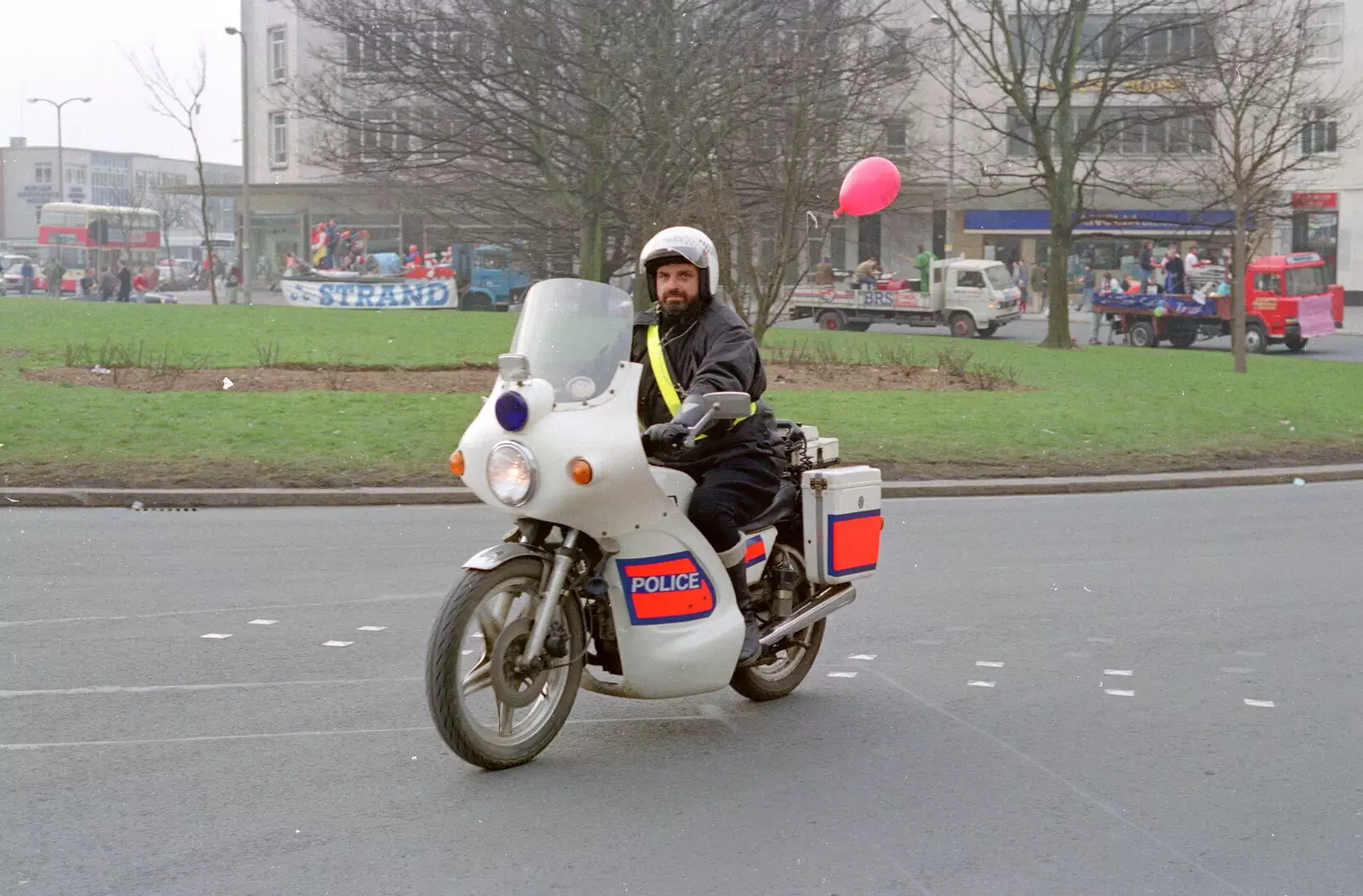 A motorbike rozzer keeps order, from Uni: PPSU "Jazz" RAG Street Parade, Plymouth, Devon - 17th February 1986