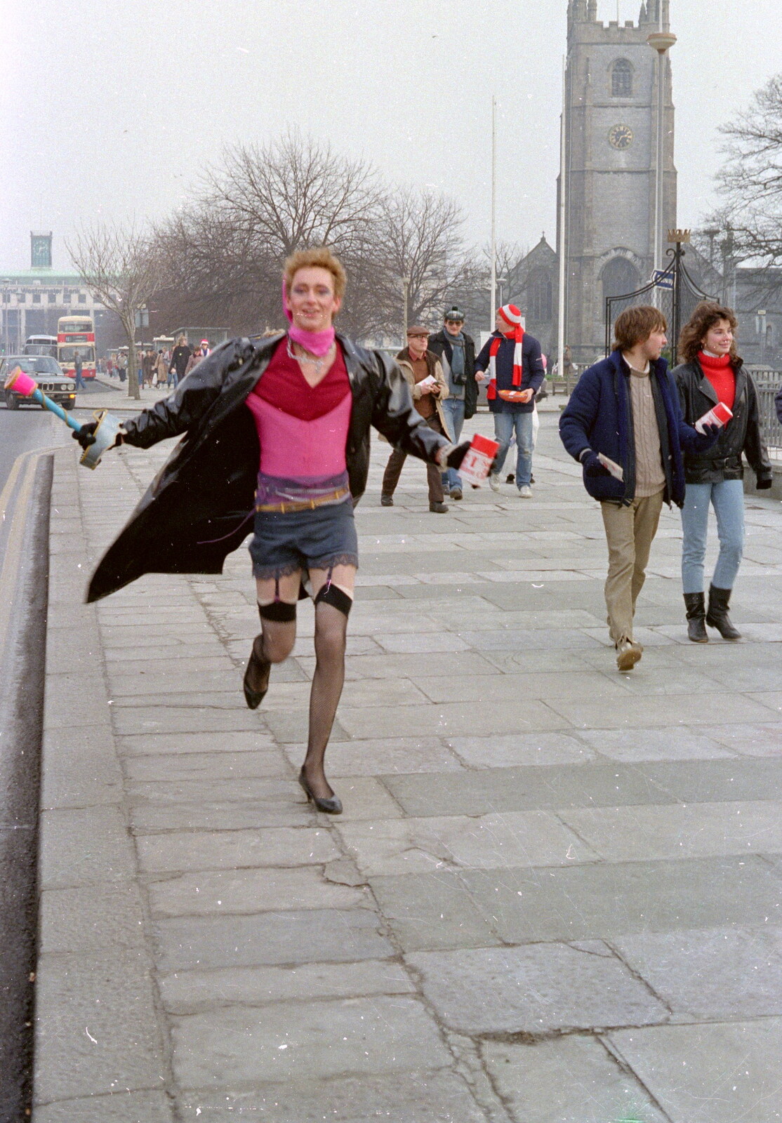 A BABS student legs it down Royal Parade from Uni: PPSU "Jazz" RAG Street Parade, Plymouth, Devon - 17th February 1986