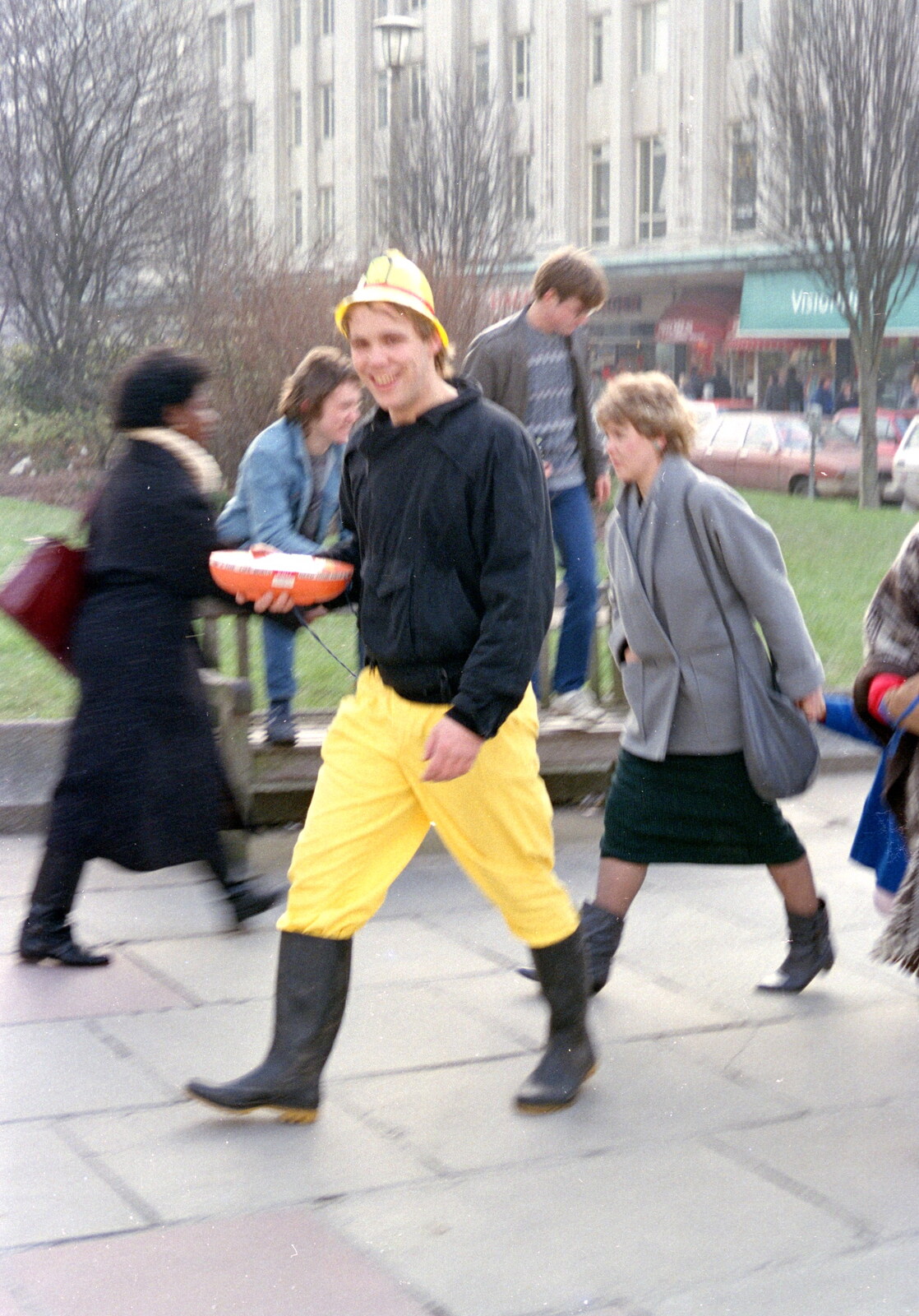 A fireman roams around from Uni: PPSU "Jazz" RAG Street Parade, Plymouth, Devon - 17th February 1986