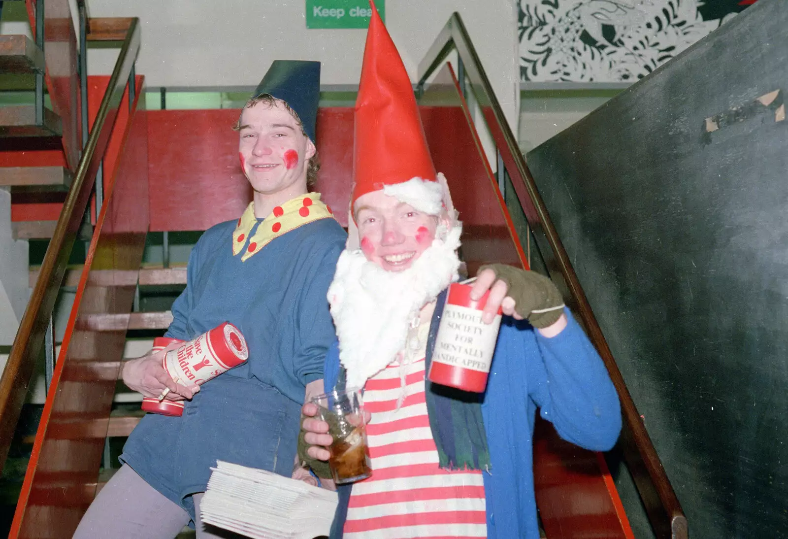 A couple of gnomes on the SU stairs, from Uni: The PPSU "Jazz" RAG Review and Charity Auction, Plymouth, Devon - 19th February 1986