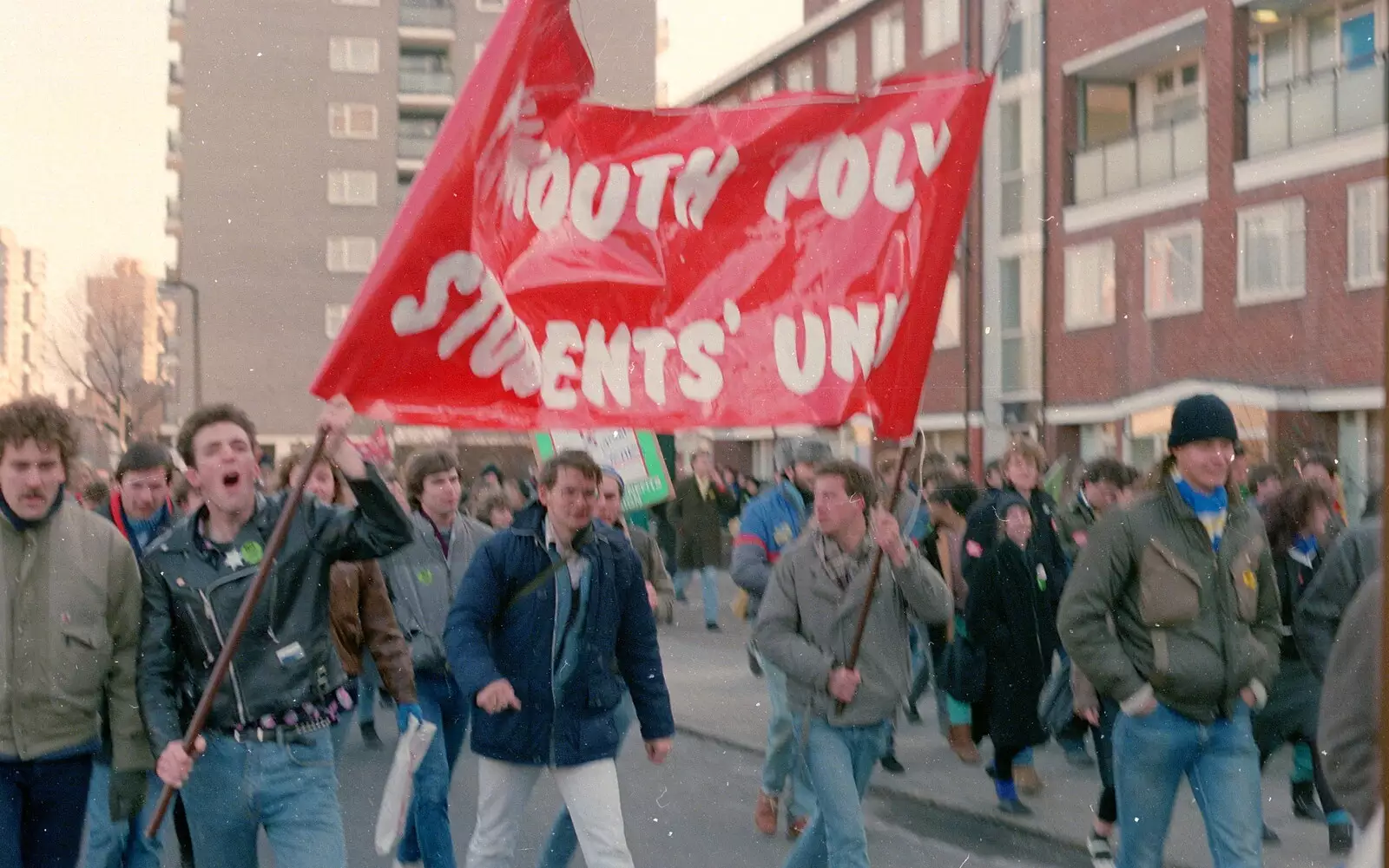 Grant holds up the PPSU banner, from Uni: No Chance Fowler! A student Demonstration, London - 26th February 1986