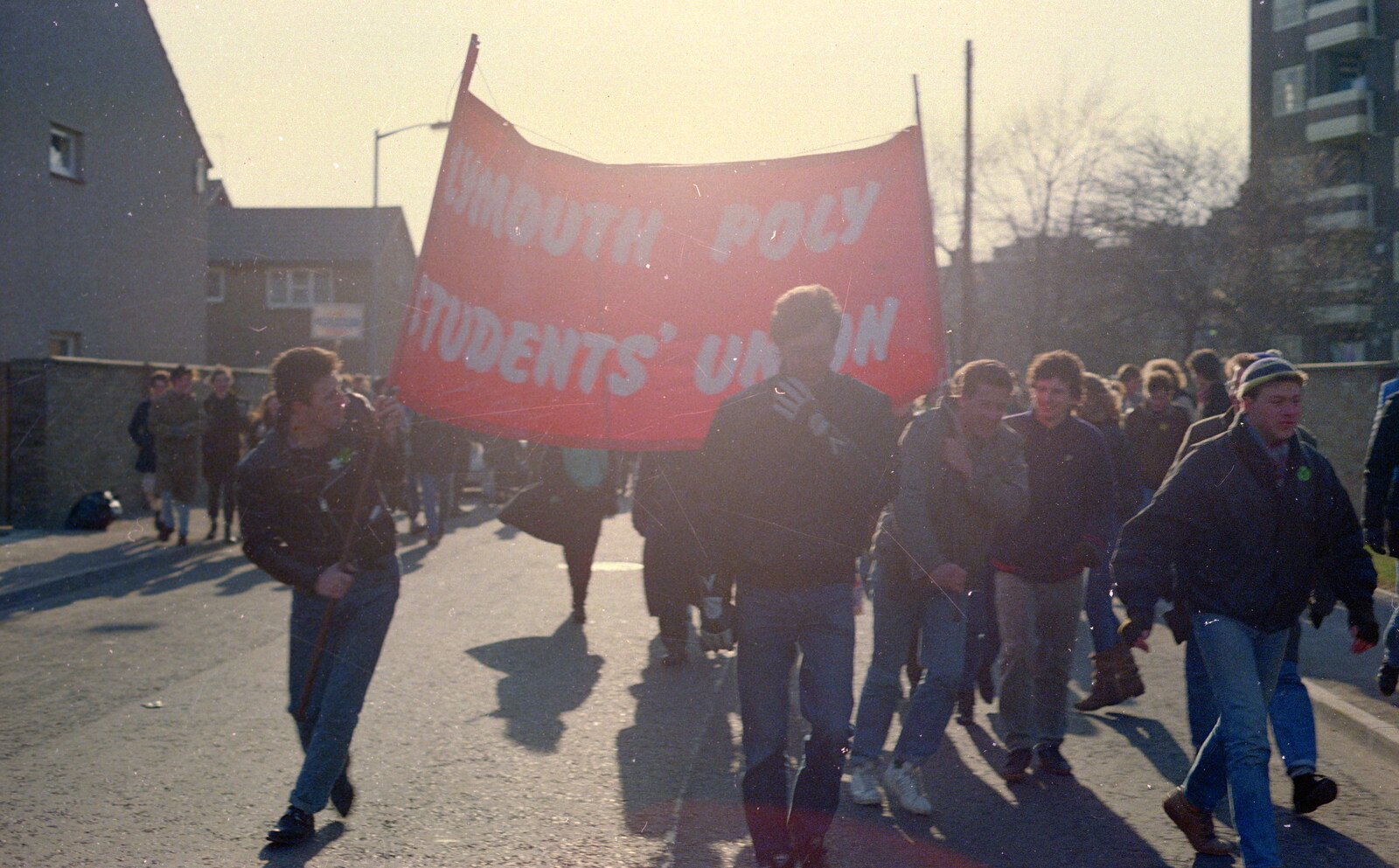 Contra-jour of marching students from Uni: No Chance Fowler! A student Demonstration, London - 26th February 1986
