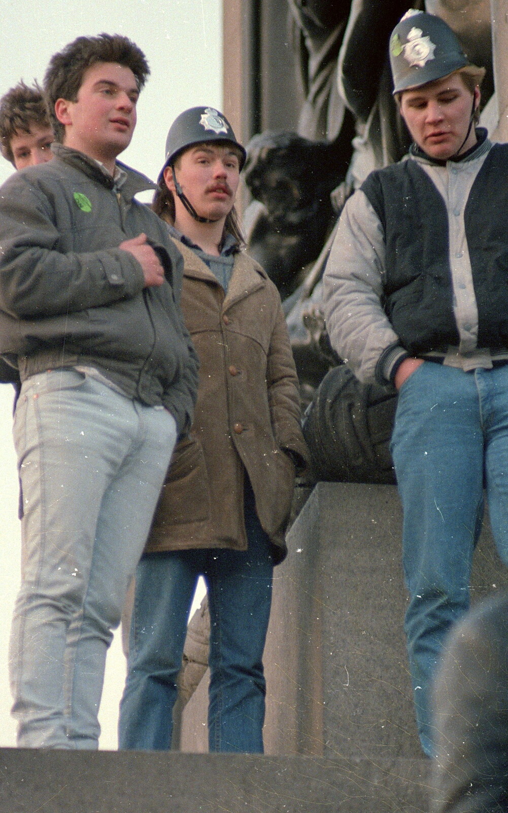 Students on Nelson's Column, with fake (?) police helmets from Uni: No Chance Fowler! A student Demonstration, London - 26th February 1986