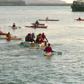 Rafts paddle out to Plymouth Sound, surrounded by canoes, Uni: Canoe Society RAG Raft Madness, Plymouth Sound - 1st March 1986