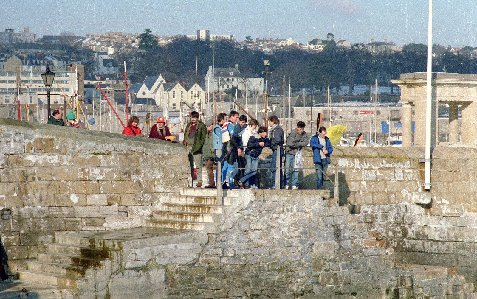 A gathering of rafters at the Mayflower Steps on the Barbican from Uni: Canoe Society RAG Raft Madness, Plymouth Sound - 1st March 1986