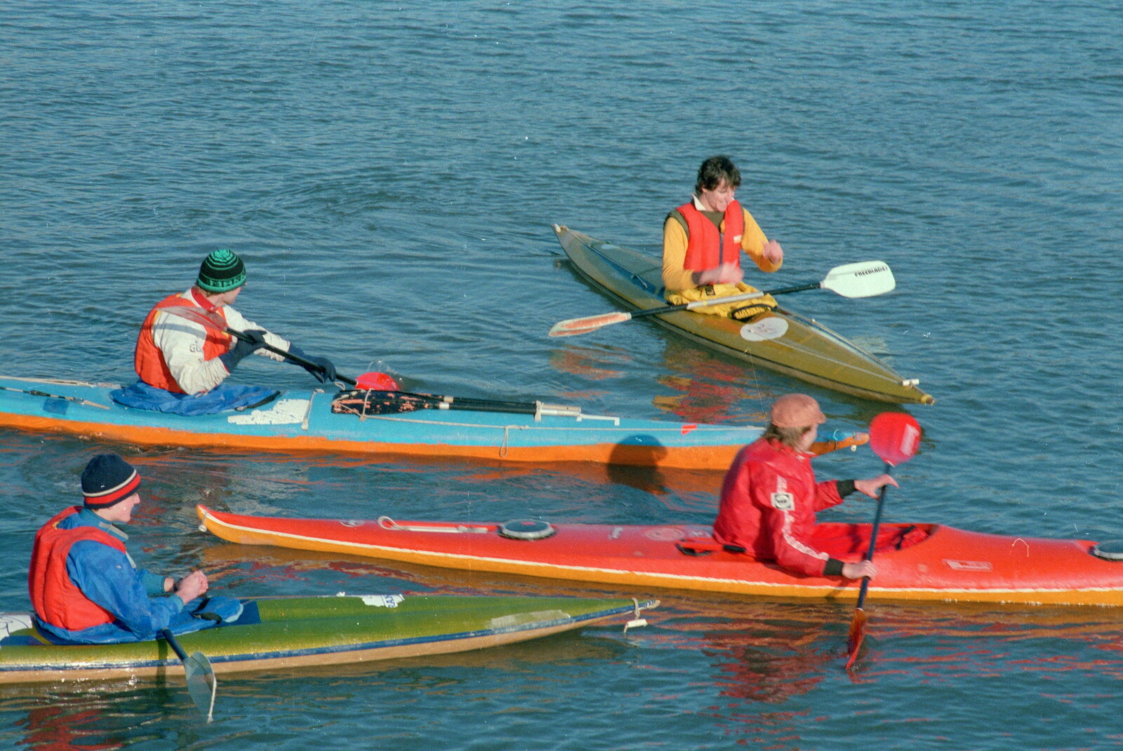 Bright canoes paddle about from Uni: Canoe Society RAG Raft Madness, Plymouth Sound - 1st March 1986
