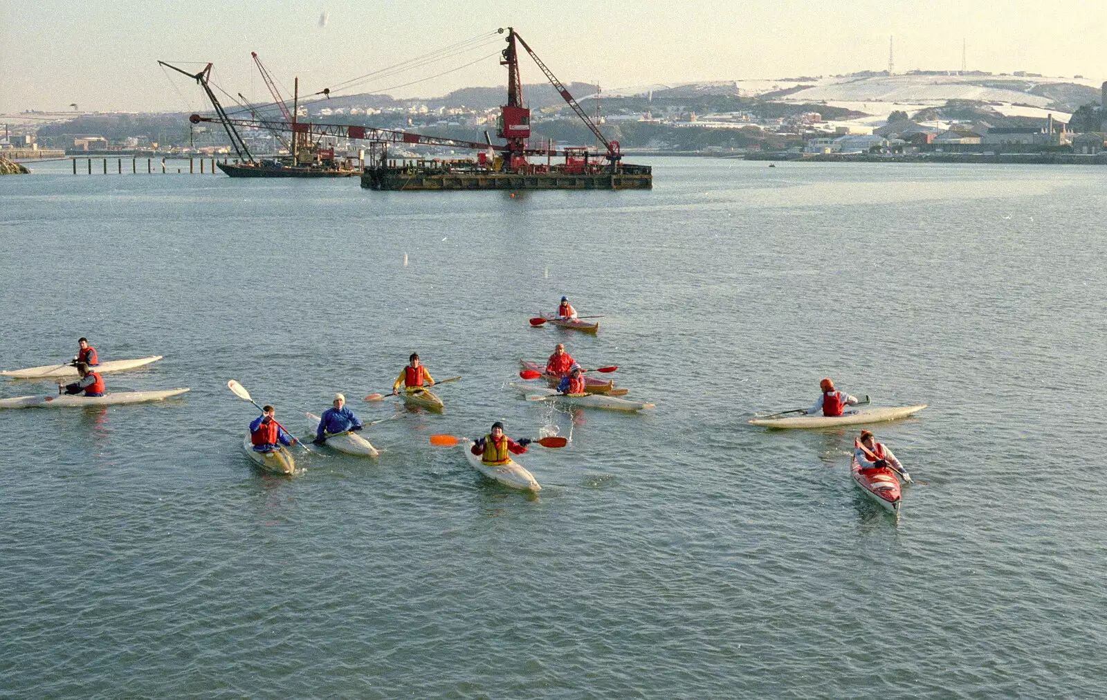 The Canoe Club, out on the Sound. Note the snow on the hills, from Uni: Canoe Society RAG Raft Madness, Plymouth Sound - 1st March 1986