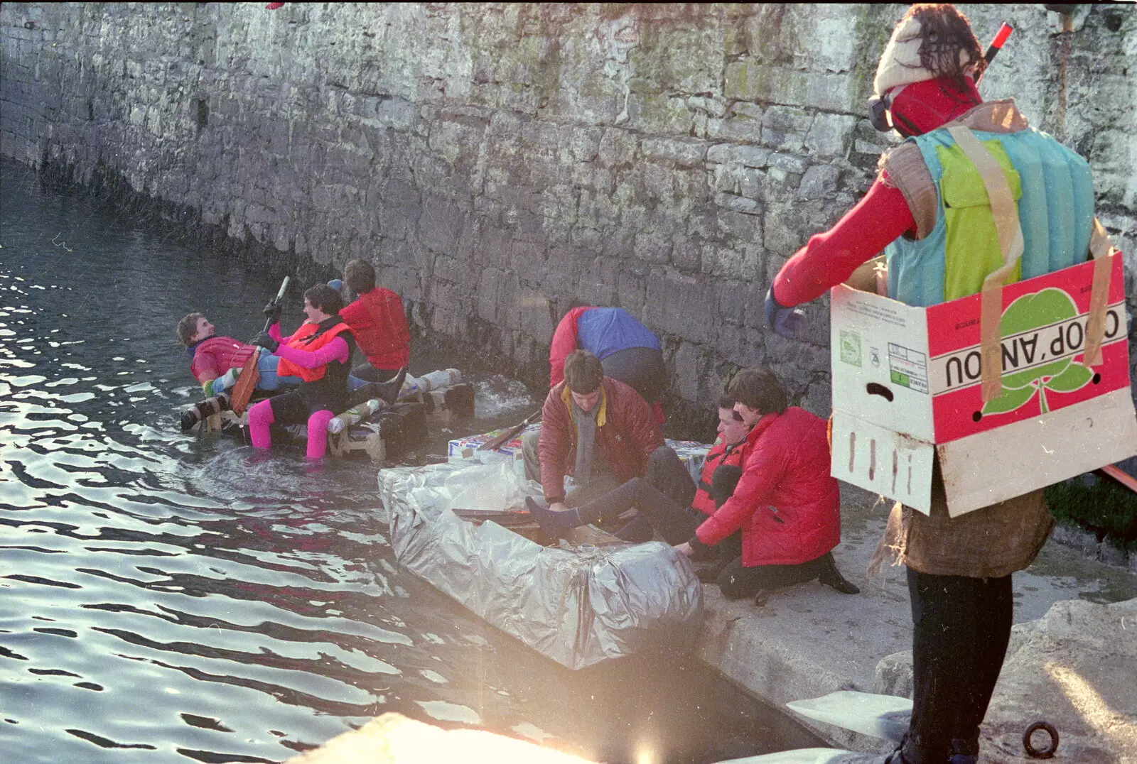 A particular brave entry equipped with nothing more than a cardboard box, from Uni: Canoe Society RAG Raft Madness, Plymouth Sound - 1st March 1986