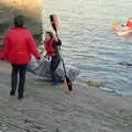 A rafter escapes the frigid water, Uni: Canoe Society RAG Raft Madness, Plymouth Sound - 1st March 1986