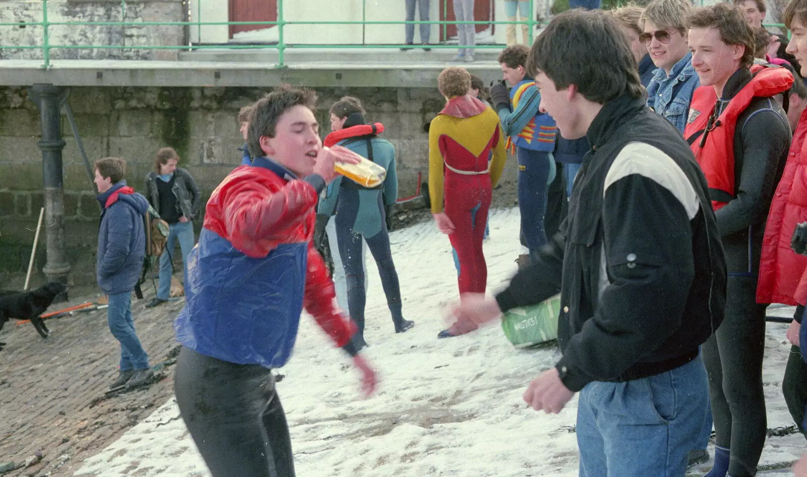 A well-earned swig of whisky, from Uni: Canoe Society RAG Raft Madness, Plymouth Sound - 1st March 1986