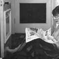 Barbara reads the newspaper in the hall, Uni: The First Year in Black and White, Plymouth Polytechnic, Devon - 8th April 1986