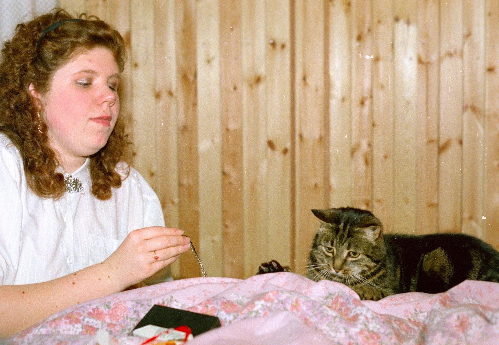 Sis teases Florence the cat with something, from Uni: The End of Term and Whitsand Bay, Plymouth and New Milton - 21st March 1986