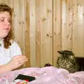 Sis teases Florence the cat with something, Uni: The End of Term and Whitsand Bay, Plymouth and New Milton - 21st March 1986