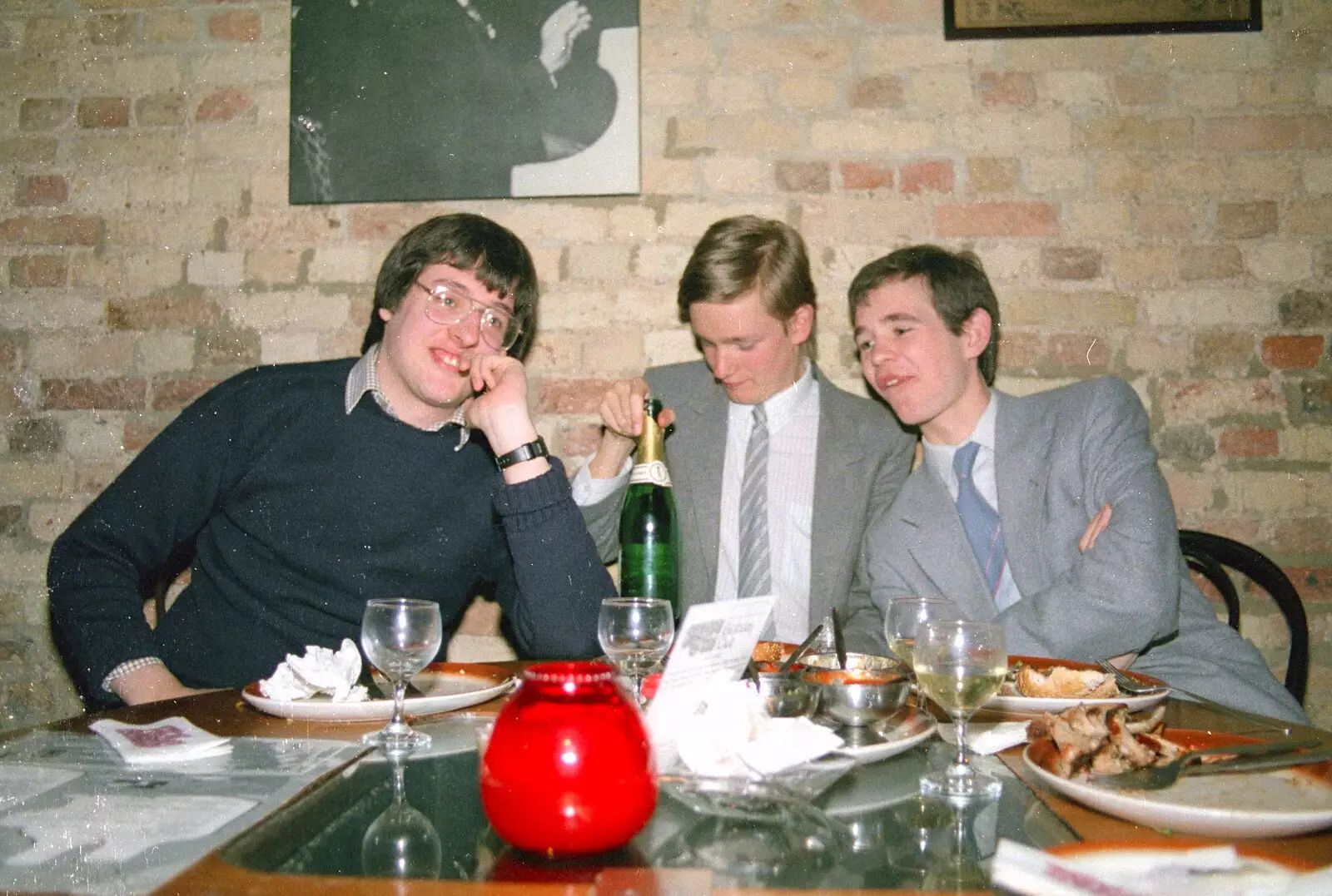 Duncan, Nosher, Phil and a bottle of fizz, from A Trip to Trinity College, Cambridge - 23rd March 1986