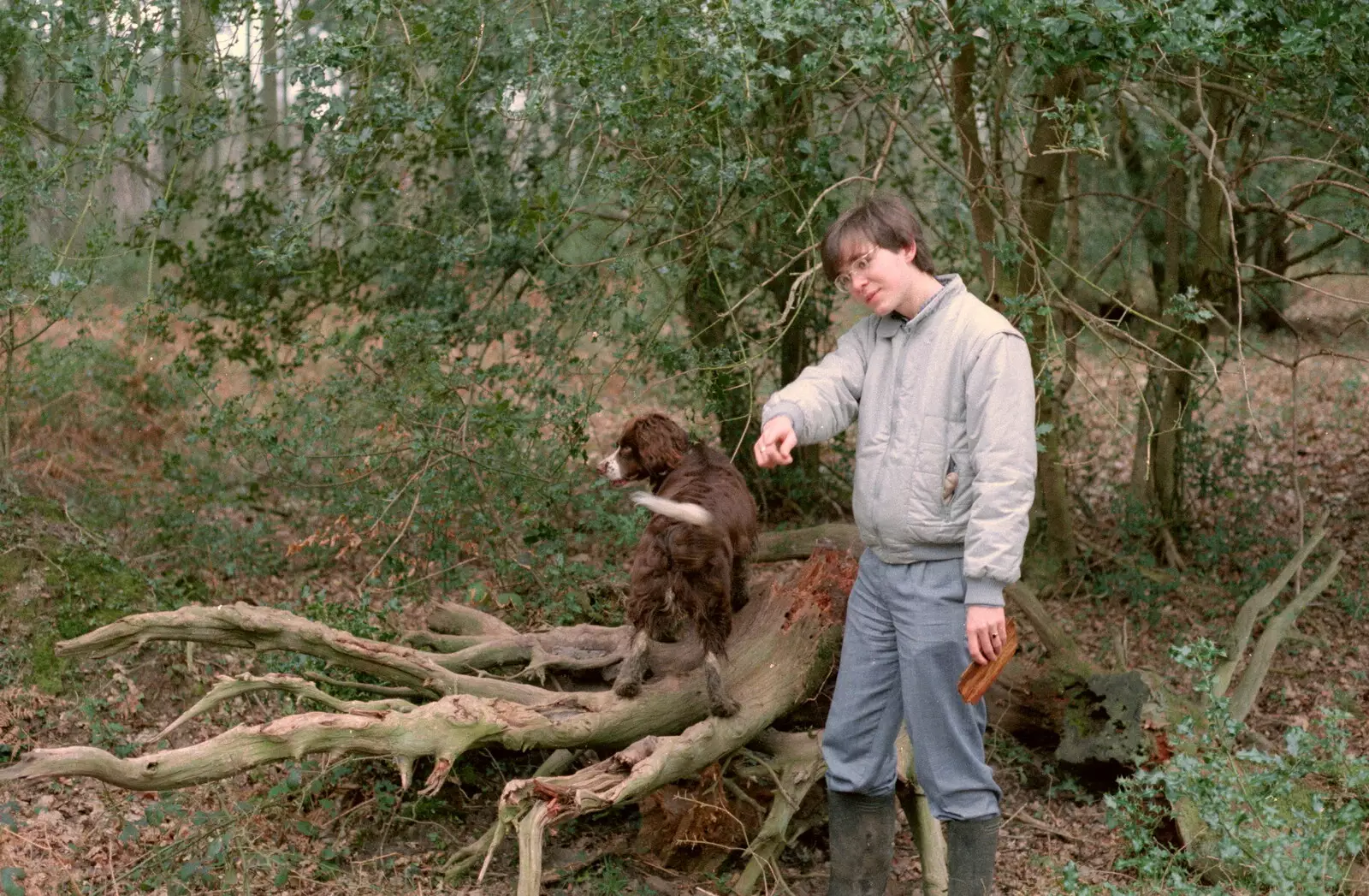 Sally on a log, and Phil, from A CB Reunion and a Trip to the Beach, Barton on Sea, Hampshire - 4th April 1986