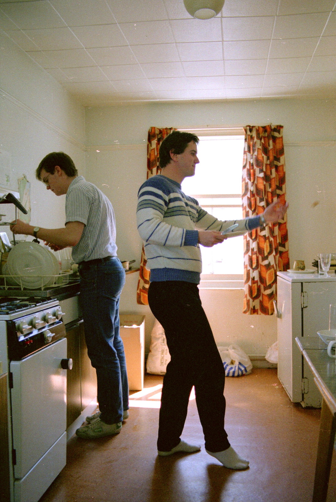 Riki flings some food around from Uni: The End of Easter Holidays, Ford Cottage and Plymouth Hoe, Hampshire and Devon - 10th April 1986