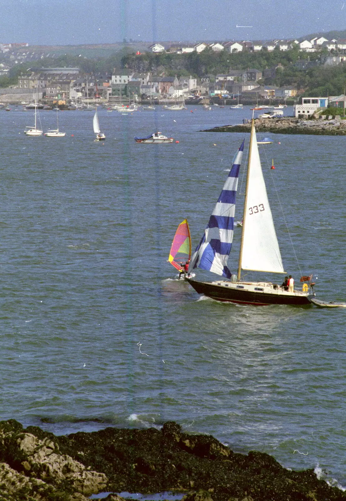 A yacht sails up towards Sutton Harbour, from Uni: Student Politics, and Hanging Around The Hoe, Plymouth - 12th April 1986