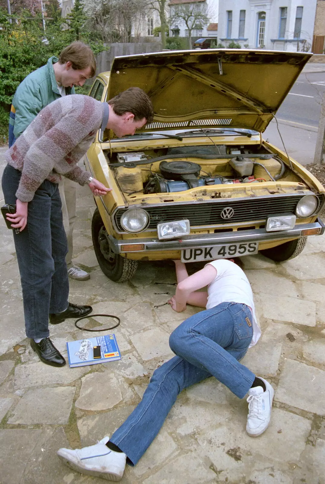 More rummaging under the engine, from Trotsky's Birthday, New Malden, Kingston Upon Thames - 20th April 1986