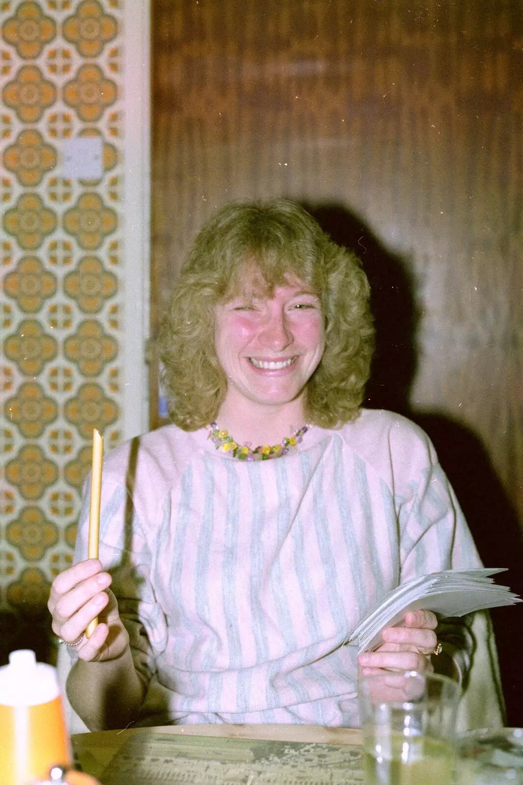 Mary Dicks peruses photos, from Uni: A Breadsticks Dinner Party and a Night in PPSU, Cromwell Road, Plymouth - 28th April 1986