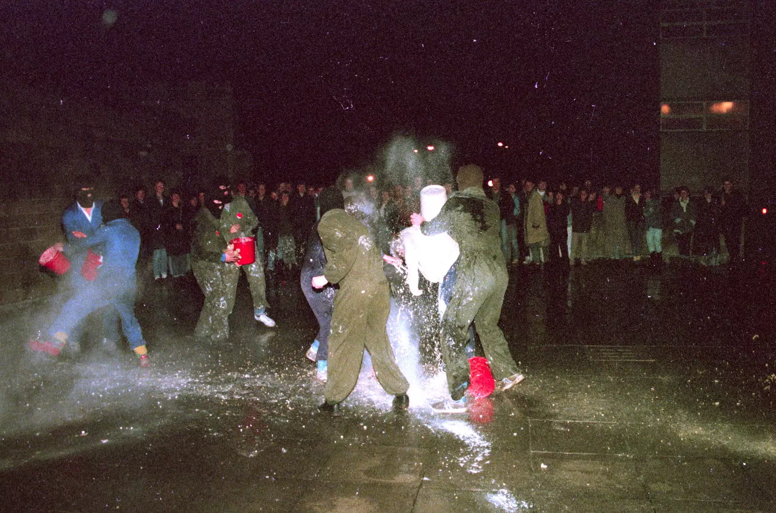 A crowd watches a random flouring, from Uni: Scenes of Plymouth and the PPSU Bar, Plymouth Polytechnic, Devon - 28th April 1986