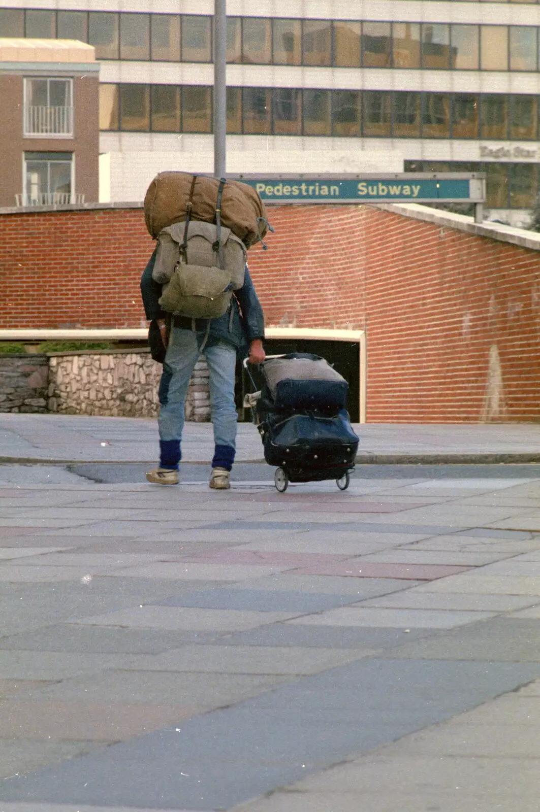 The tramp whose whole life is in a rucksack and trolley, from Uni: A Plymouth Hoe Panorama, Plymouth, Devon - 7th May 1986