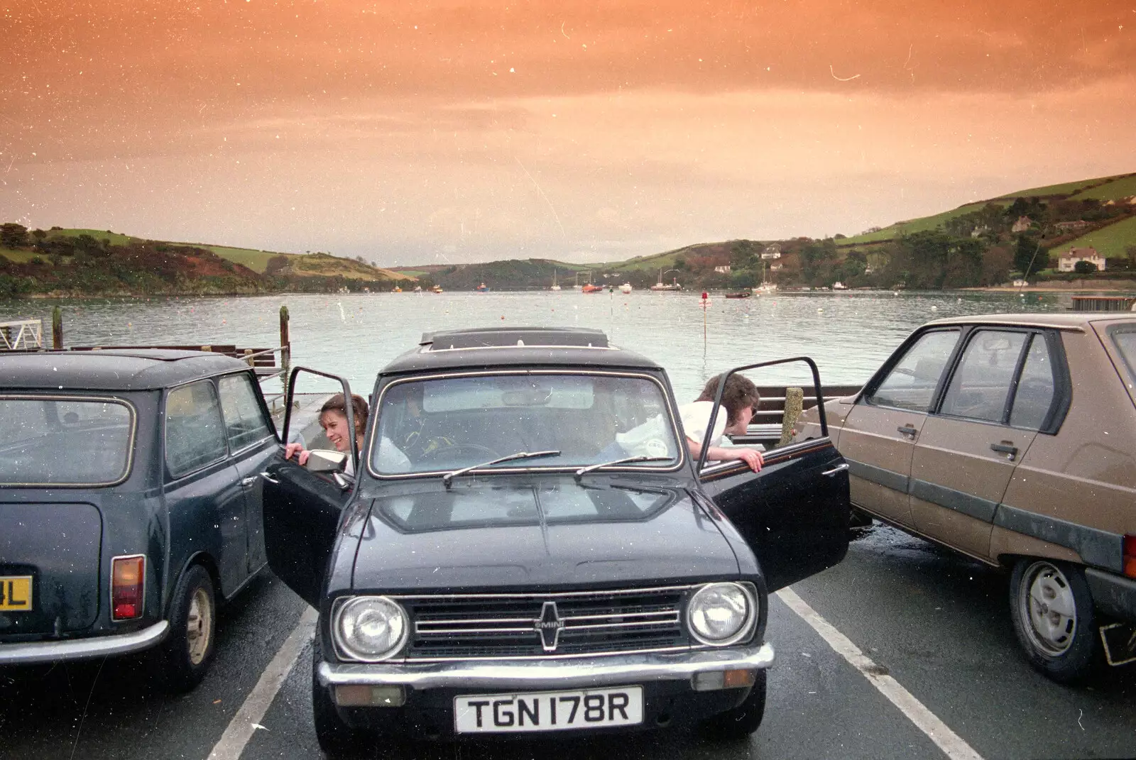 Michelle and Ruth pile out of their Mini, from Uni: The Plymouth Polytechnic Satique Project, Salcombe and Plymouth - 10th May 1986