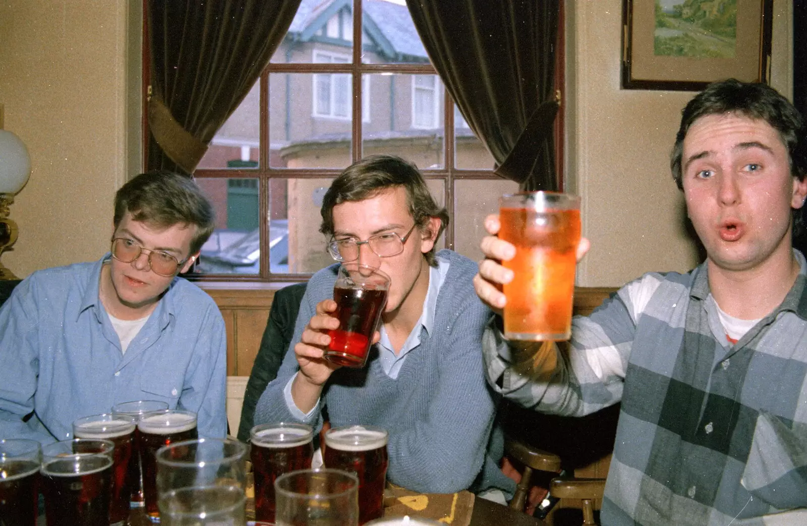 Andy gets started as Riki raises his glass, from Uni: Neath Road and a JSV Happy Hour, Plymouth - 15th May 1986