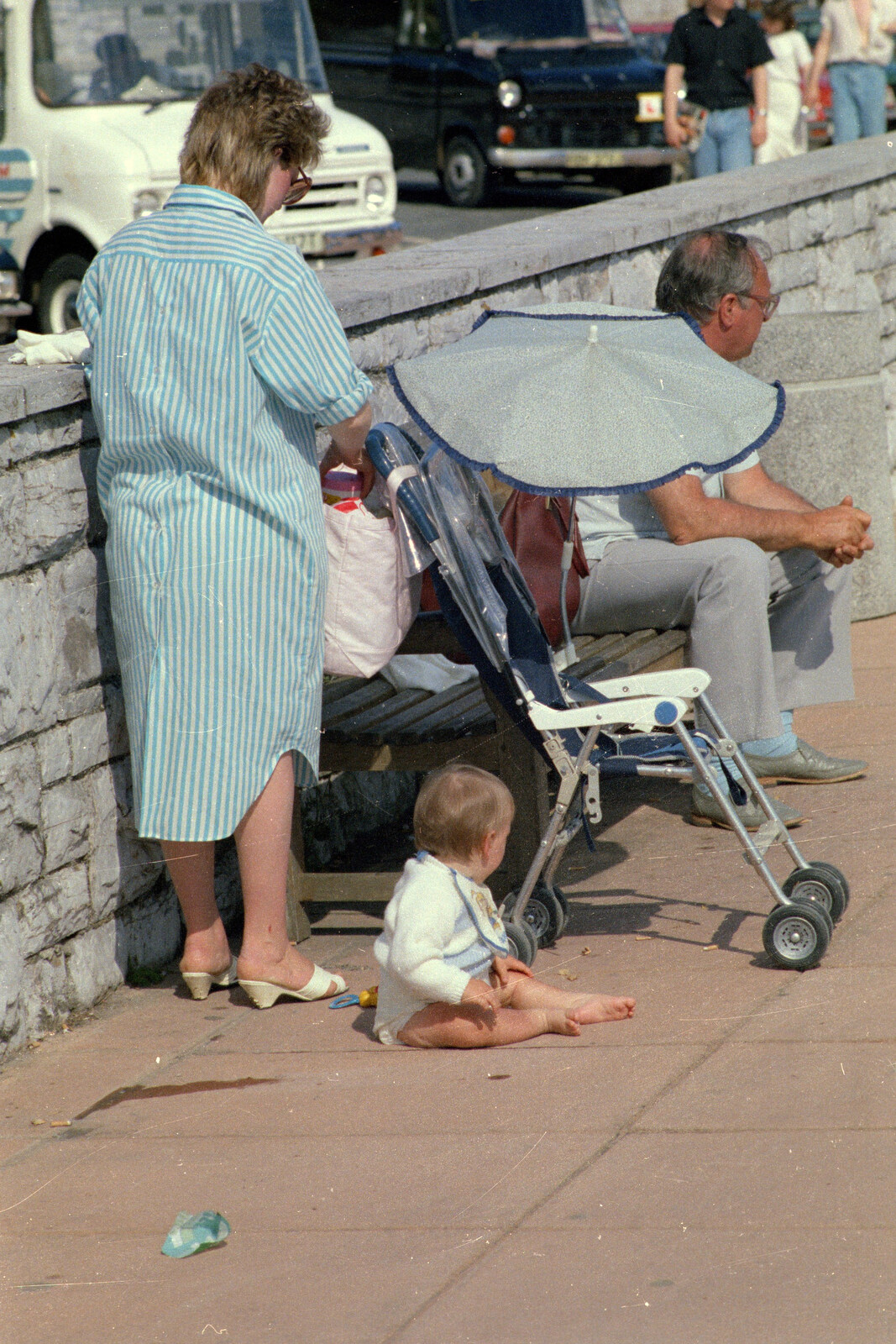A baby sits on the pavement from Uni: Phil and Anna Visit Nosher, Plymouth, Devon - 18th May 1986