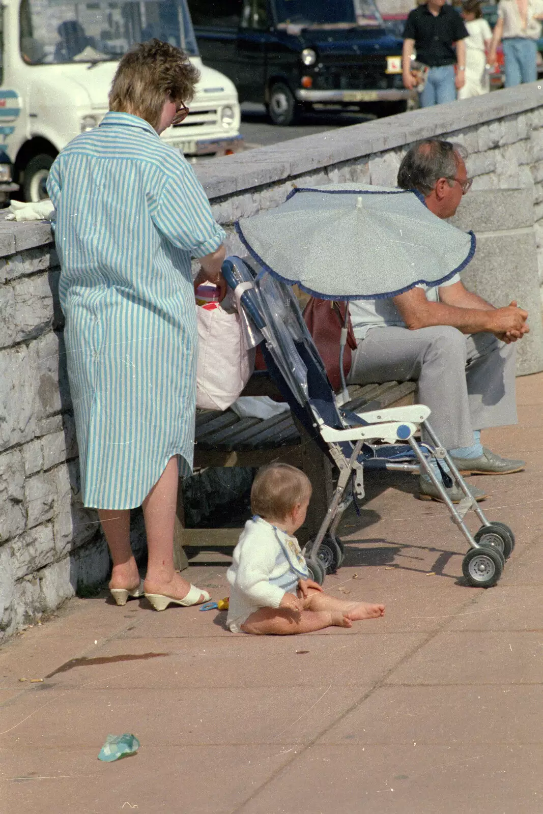 A baby sits on the pavement, from Uni: Phil and Anna Visit Nosher, Plymouth, Devon - 18th May 1986