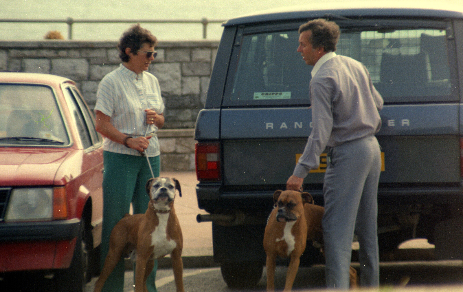 A couple of bulldogs meet up on the Hoe from Uni: Phil and Anna Visit Nosher, Plymouth, Devon - 18th May 1986