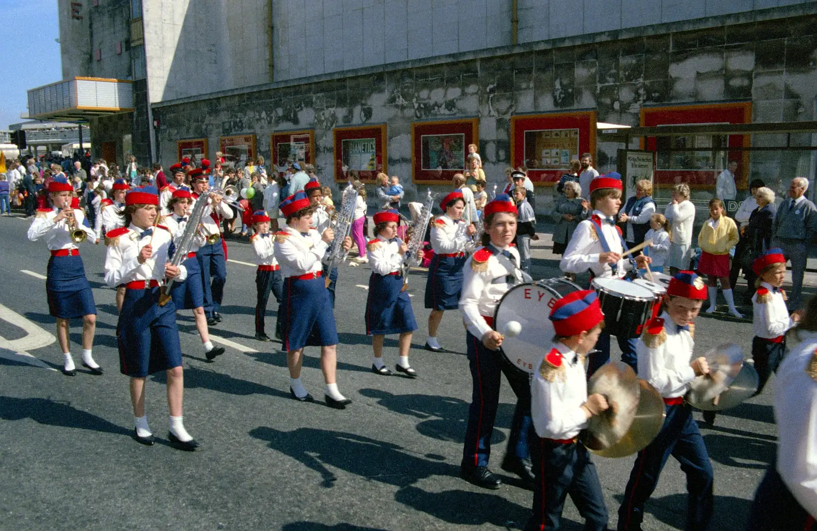 Another marching band passes the cinema, from Uni: The Lord Mayor's Procession, Plymouth, Devon - 24th May 1986