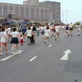 Some runners head up past Drake Circus, Uni: Sport Aid - Run The World, Plymouth, Devon - 25th May 1986