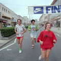 Sam Kennedy, Mark Wilkins and co pass the finish line on New George Street, Uni: Sport Aid - Run The World, Plymouth, Devon - 25th May 1986