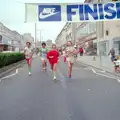 Sam, Mark, ? and Ally Flemming run to the finish, Uni: Sport Aid - Run The World, Plymouth, Devon - 25th May 1986