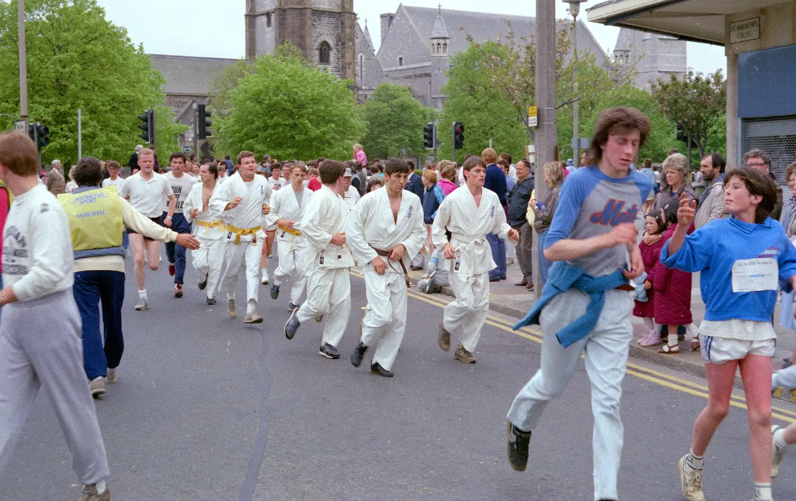 A karate club head up St. Andrew's Cross, from Uni: Sport Aid - Run The World, Plymouth, Devon - 25th May 1986