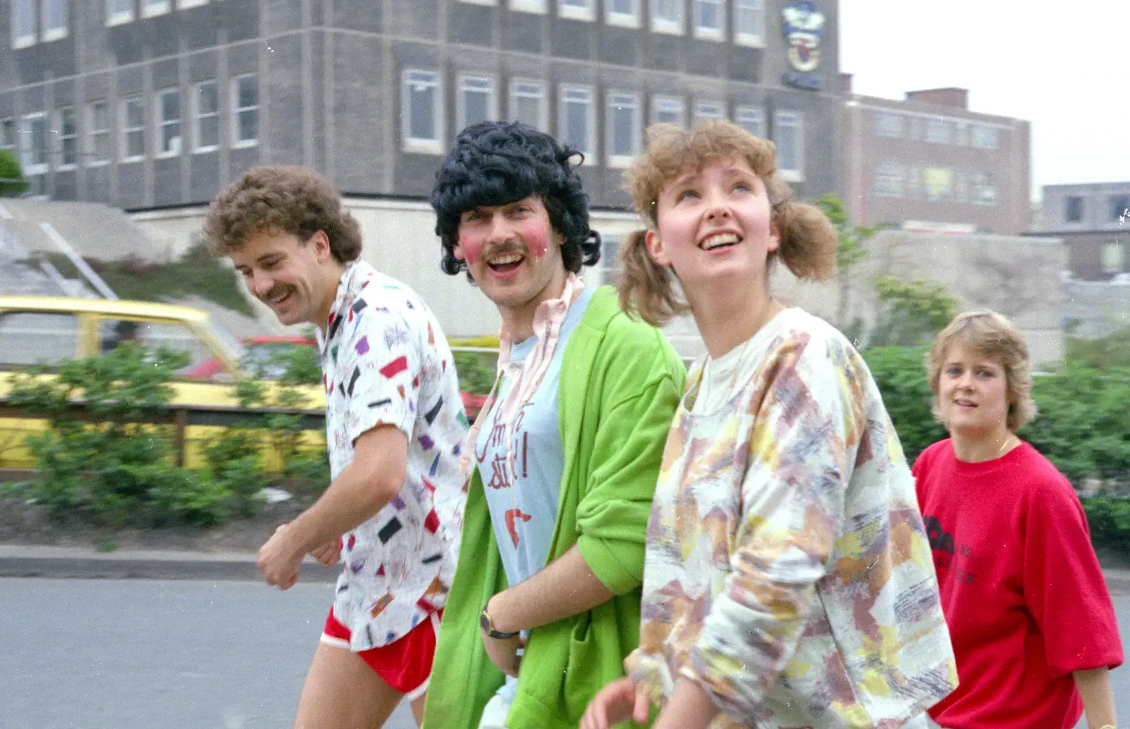 Sam, Mark and Alison run up Charles Street, from Uni: Sport Aid - Run The World, Plymouth, Devon - 25th May 1986