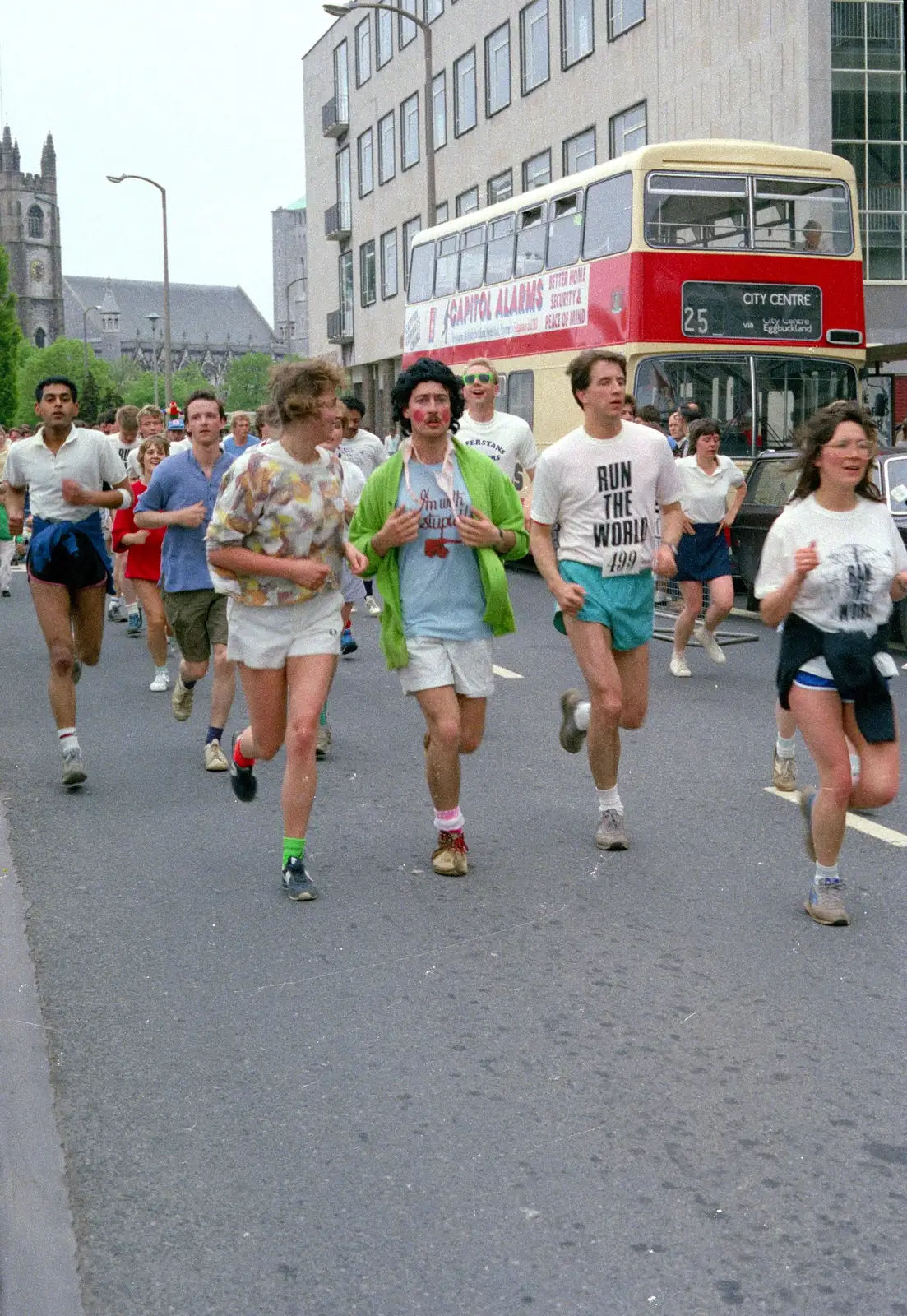 Alison and Mark and a Plymouth City bus, from Uni: Sport Aid - Run The World, Plymouth, Devon - 25th May 1986