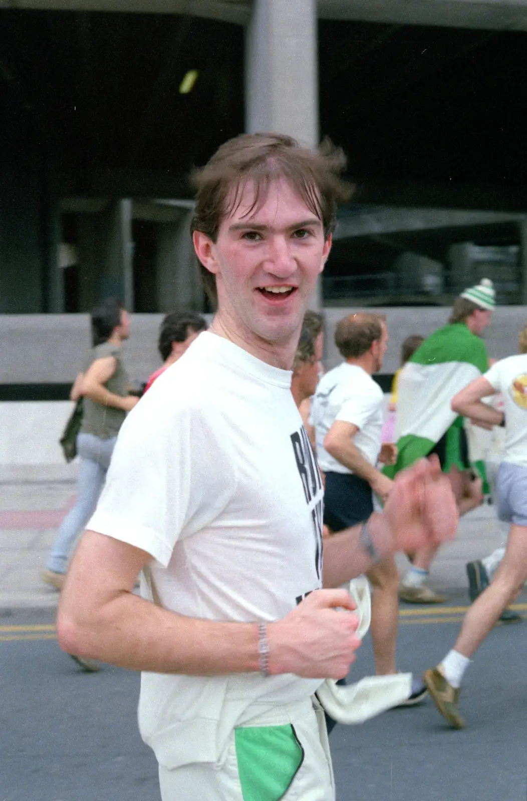 James runs past Drake Circus, from Uni: Sport Aid - Run The World, Plymouth, Devon - 25th May 1986