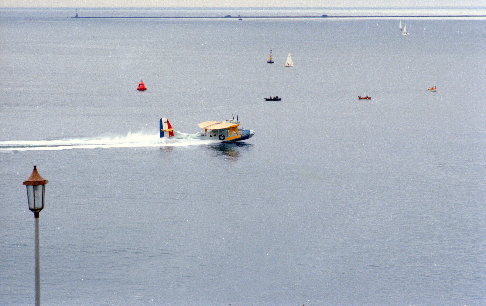 Uni: The Navy-Curtiss NC-4 Trans-Atlantic Flight, Plymouth Sound - 31st May 1986: The Catalina churns up the water as it speeds along