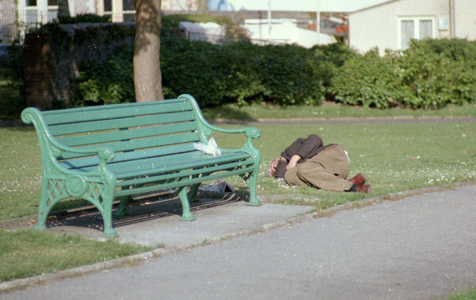 Uni: The Navy-Curtiss NC-4 Trans-Atlantic Flight, Plymouth Sound - 31st May 1986: A tramp sleeping by a park bench