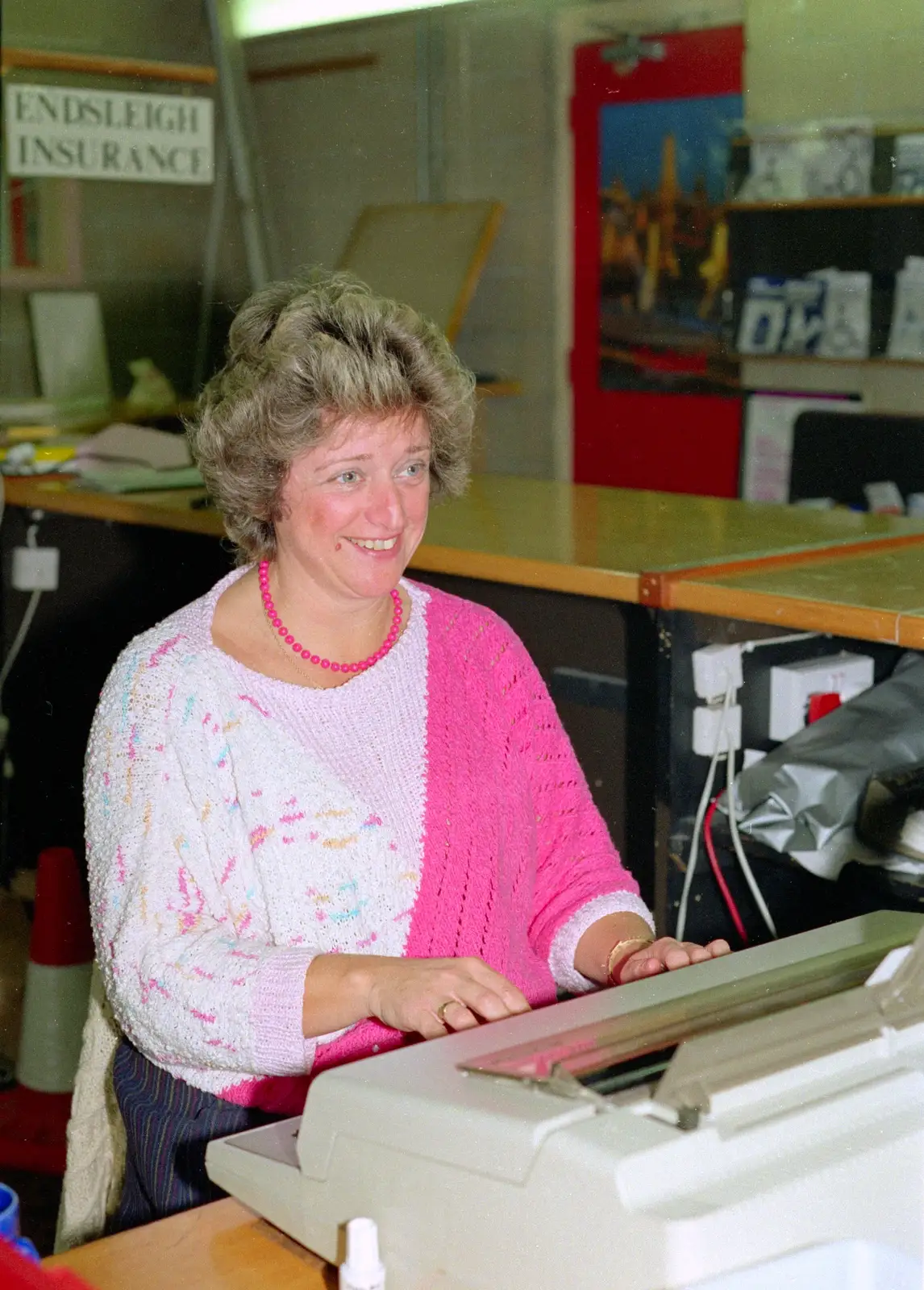 Julie types something on a real typewriter, from Uni: PPSU Office Staff and a Night in the Students' Union Bar, Plymouth - 10th June 1986