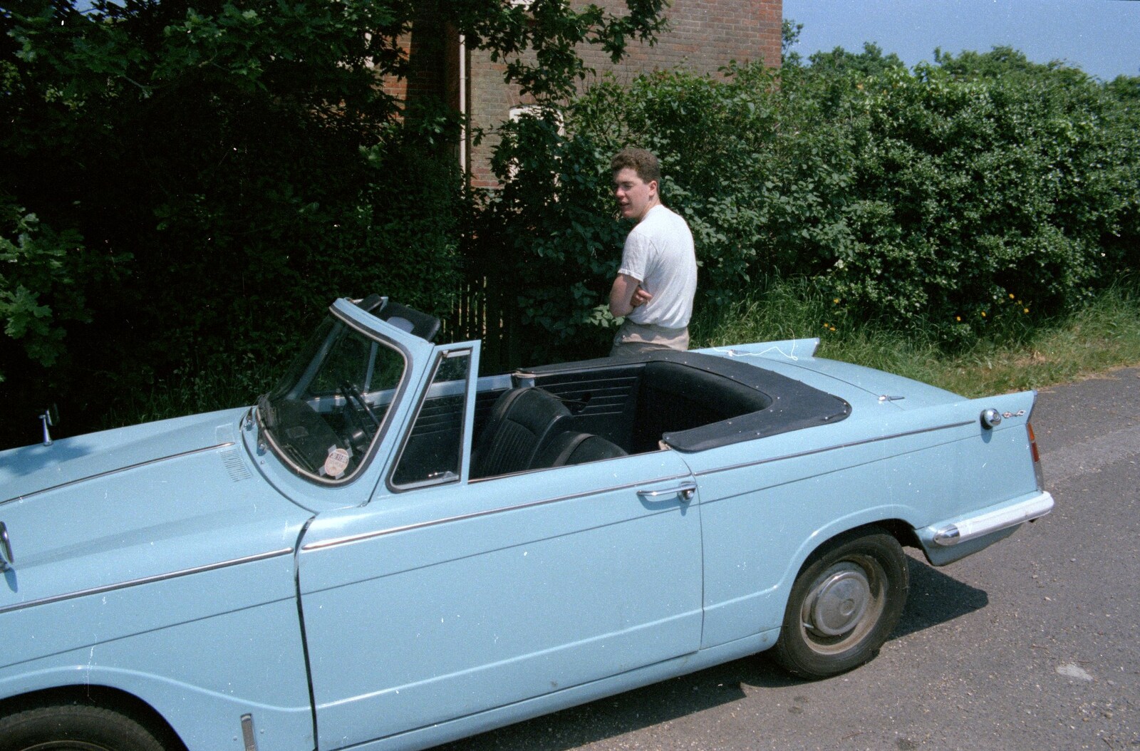 Jon and his baby-blue Triumph Herald from A Ford Cottage Miscellany, Barton on Sea, Hampshire - 7th July 1986