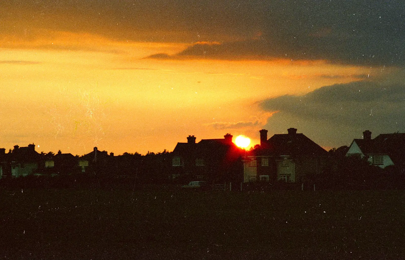 Sunset behind the houses of Barton, from A Ford Cottage Miscellany, Barton on Sea, Hampshire - 7th July 1986