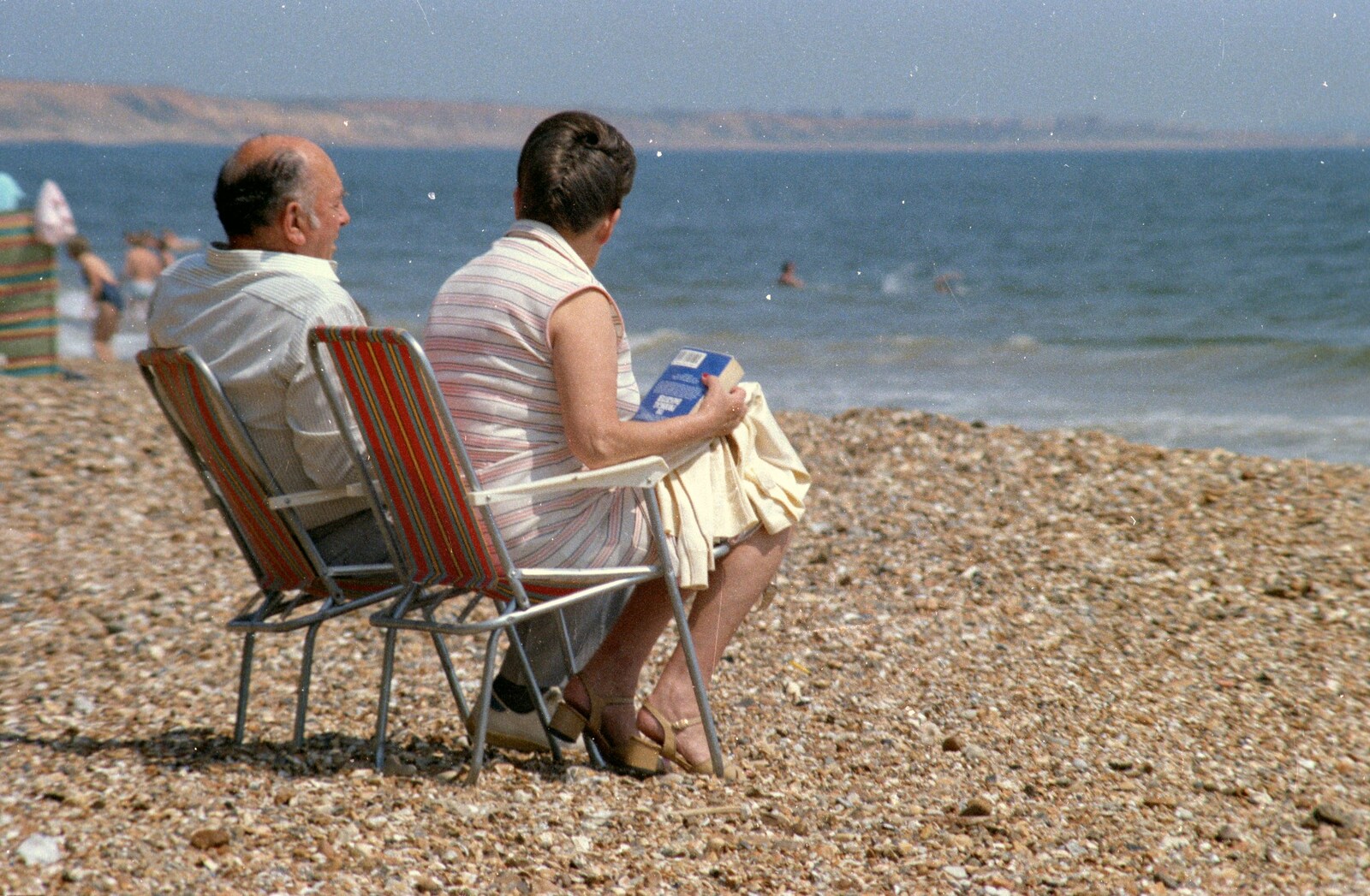 An old couple on the beach from A Ford Cottage Miscellany, Barton on Sea, Hampshire - 7th July 1986