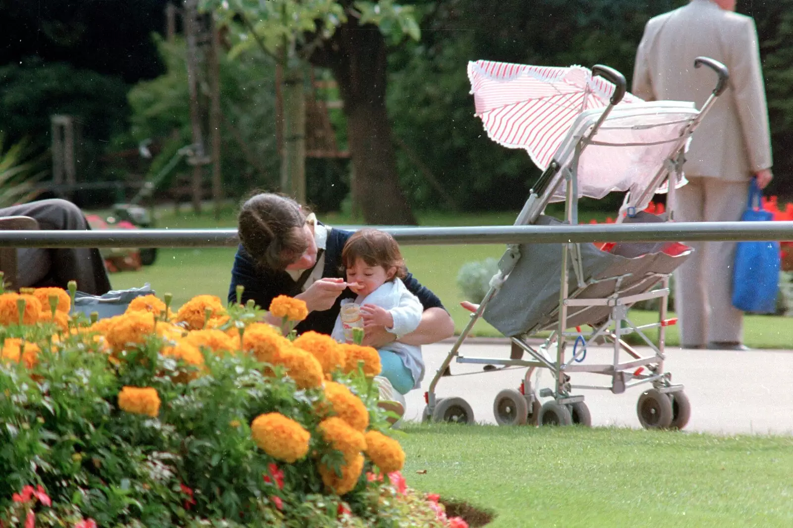 A baby gets fed in Bournemouth, from A Vineyard Miscellany, Bransgore and the New Forest - 18th July 1986