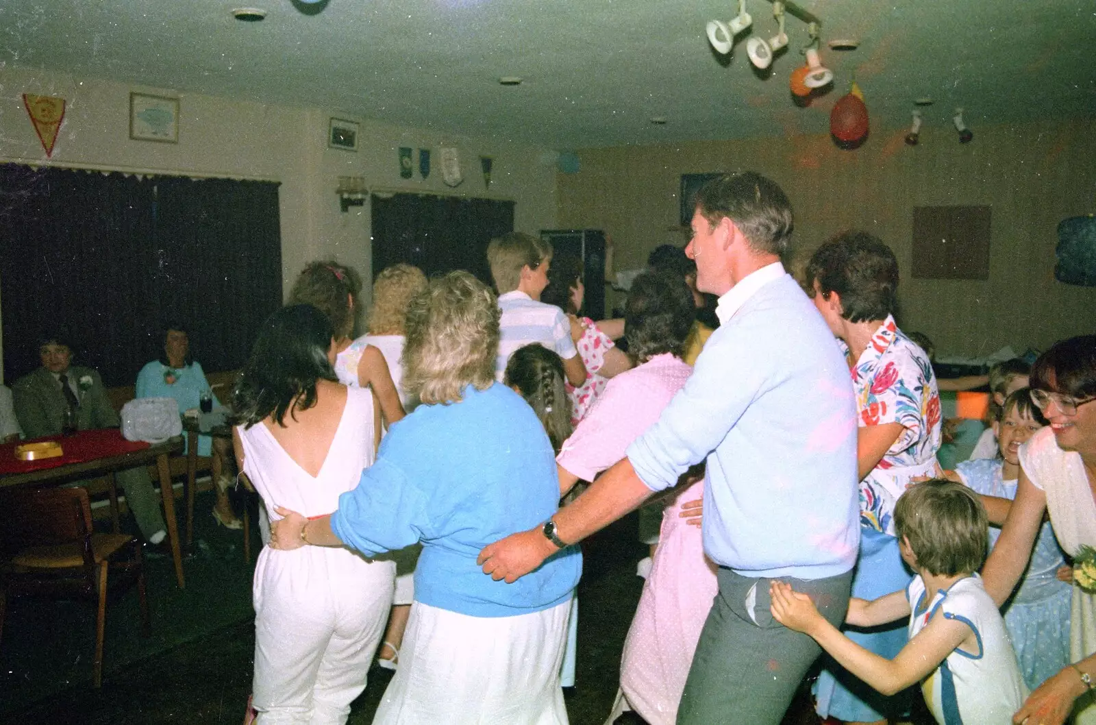 Brian and Carol are doing a conga, from A CB Wedding and a Derelict Railway, Hampshire - 20th July 1986