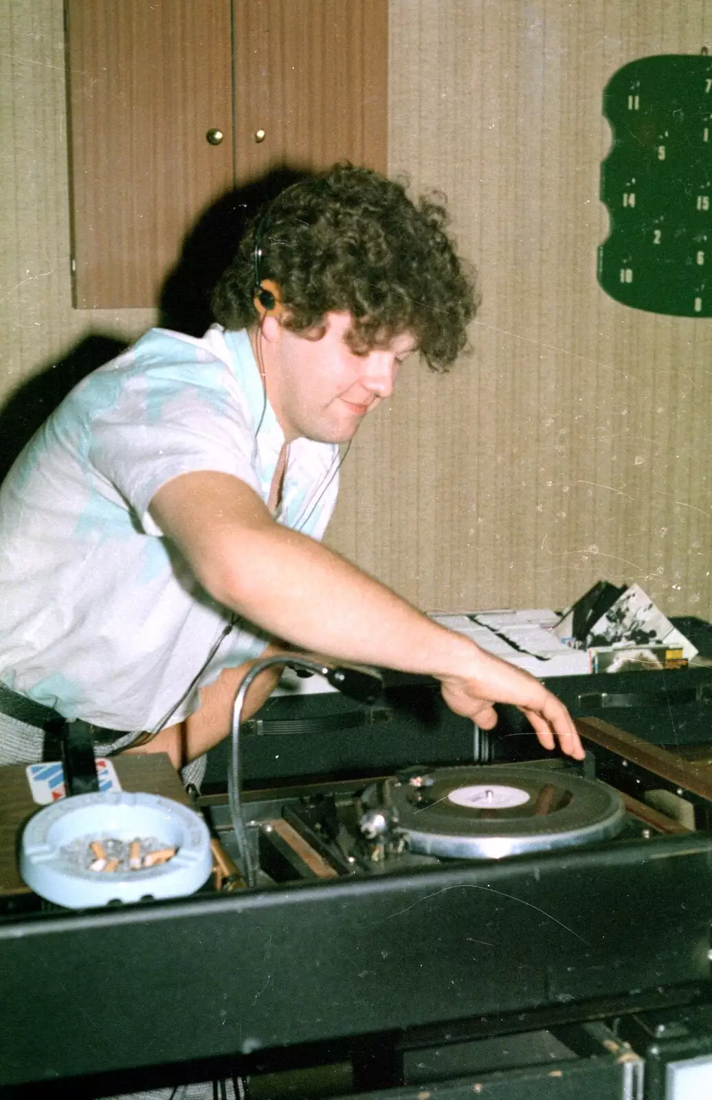 Carol's boyfriend spins up the 45s, from A CB Wedding and a Derelict Railway, Hampshire - 20th July 1986