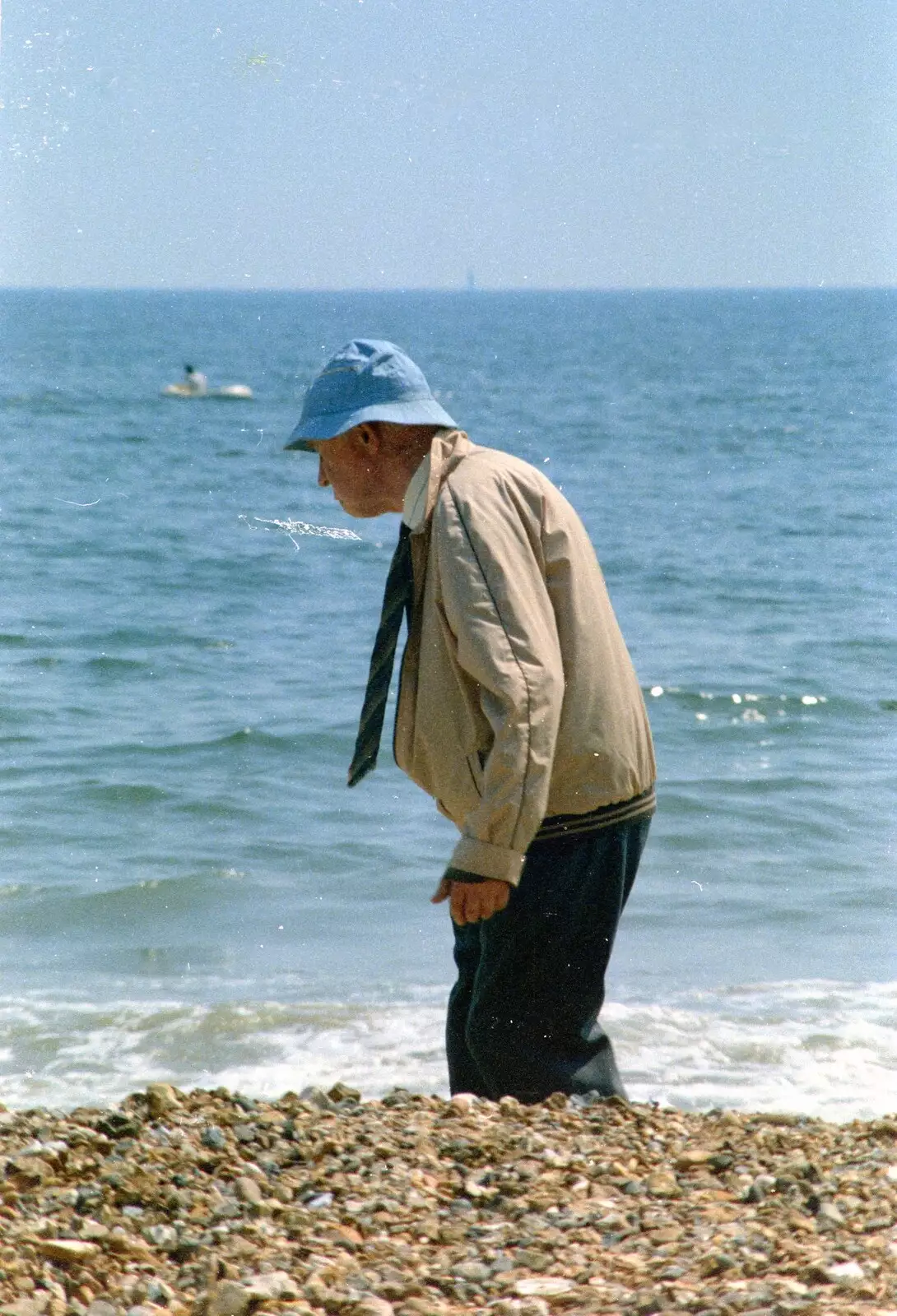 An old dude stumps about on the beach, from On the Beach Again and the CB Gang at the Pub, Barton on Sea and Hordle, Hampshire - 25th July 1986