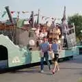 Sean walks along by the McCarthy and Stone float, Sean and the New Milton Carnival, Hampshire - 1st August 1986